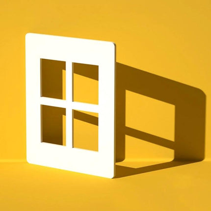 Light Shadow Board for Still Life and Portrait Photography showing white window-frame prop casting strong shadow on yellow background