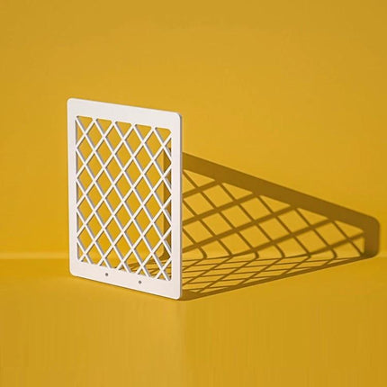Light Shadow Board for Still Life and Portrait Photography — white lattice board casting patterned shadow on yellow background, waterproof studio prop