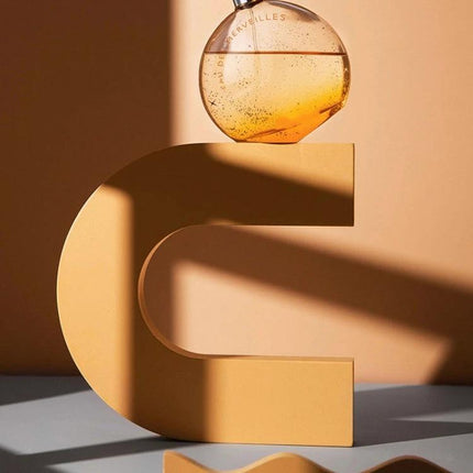 Light Shadow Board for Still Life and Portrait Photography showing a sculptural C-shaped prop with glass orb and dramatic shadows