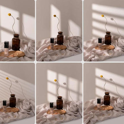 Light Shadow Board for Still Life and Portrait Photography showing vase, fabric, and defined shadow patterns for studio setup