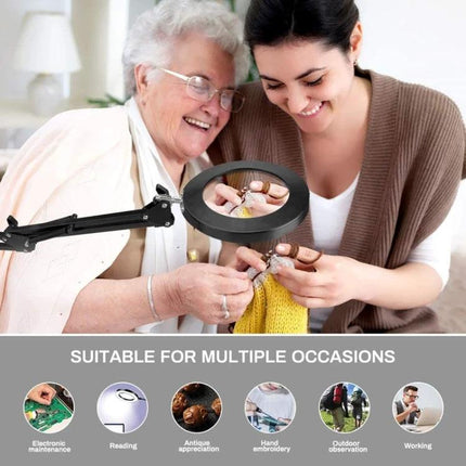Versatile Clip Magnifying Lamp for Home Reading and Crafts showing elderly woman and caregiver knitting with 5x 105mm lens and clamp base