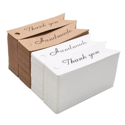 Thank You Swallow Tail Gift Tags, 100 Pcs, Cowhide - rustic handmade thank you and handmade swallow-tail gift labels in brown and white stacks