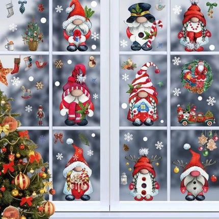 Christmas Window Cling Set With Santa, Snowman And Penguins - reusable electrostatic PVC window decals featuring Santa gnomes, snowflakes, penguins, wreaths