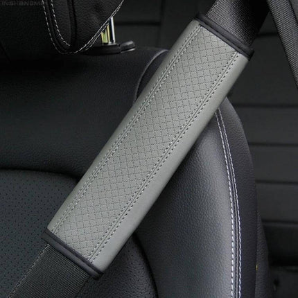 Fiber Leather Embossed Car Seat Belt Shoulder Cover 23x6.5 cm on black car seat to reduce shoulder pressure and add padded comfort