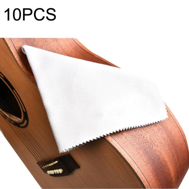 Soft Fiber Cloths for Everyday Musical Instrument Care - white microfiber cloth on acoustic guitar to remove smudges and polish finish