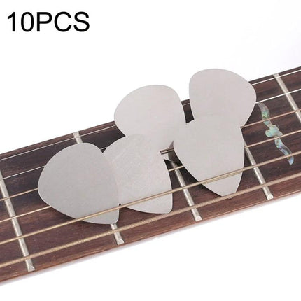 Stainless Steel Guitar Picks for Everyday Music Practice Sessions - set of 10 durable metal picks on guitar fretboard