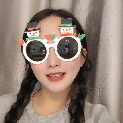 Christmas Hair Clip Personalized Holiday Accessory showing white plastic injection-molded snowman sunglasses clip on woman