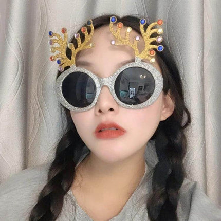 Christmas Hair Clip Personalized Holiday Accessory straight black-braided model wearing festive reindeer antler sunglasses and plastic clip