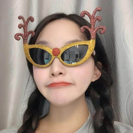 Christmas Hair Clip Personalized Holiday Accessory — girl wearing glitter reindeer antler sunglasses-style hair clip for festive school and party looks