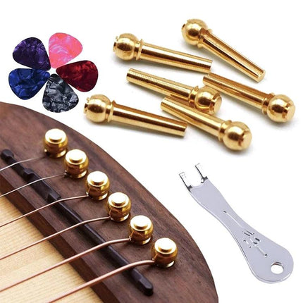 Guitar Tuning Clip Set for Daily Music Sessions at Home showing gold bridge pins, picks and string wrench on acoustic guitar