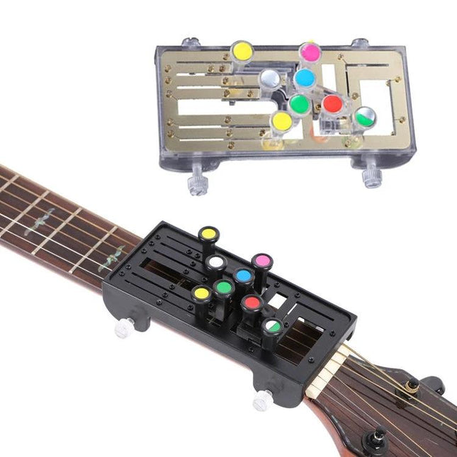 Compact Chord Aid for Home Guitar Practice and Learning - compact chord trainer clipped on guitar neck with colored button markers for beginner practice