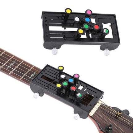 Compact Chord Aid for Home Guitar Practice and Learning shown mounted on guitar neck with colored button chord markers