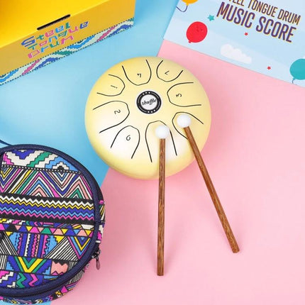 Shuffle Steel Tongue Drum for Daily Home Relaxation Sessions - compact pebble-shaped gold drum with mallets and carrying case