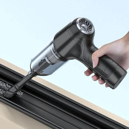 SUITU Car Wireless Wet And Dry Handheld Vacuum Cleaner Black cleaning car track with crevice tool showing compact cordless design and USB charging