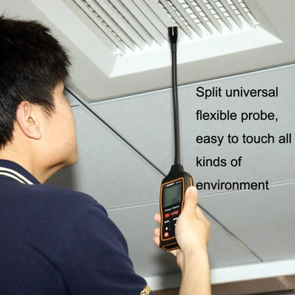 SNDWAY Halogen Gas Detector for Automotive Refrigerant Leaks being used with flexible probe to find ceiling AC refrigerant leaks quickly
