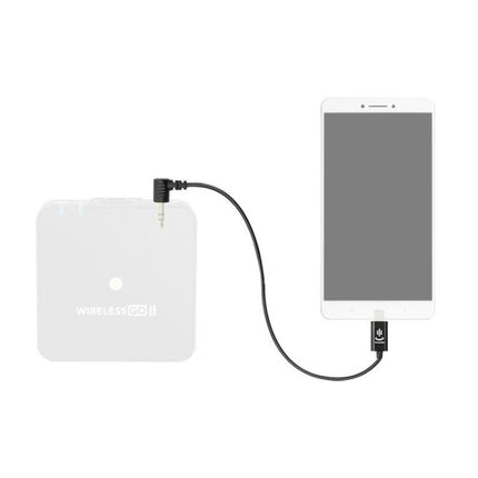 Adapter for Everyday Mobile Microphone Connections showing compact wireless transmitter linked to smartphone via Type-C cable for podcasting and recording