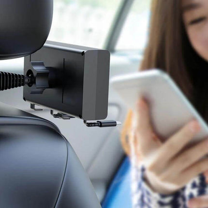 65W PD Dual Cable Retractable Car USB Charger For In Car Use mounted behind headrest with retractable cord charging phone in backseat