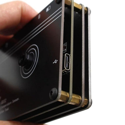 Handheld Thermal Imaging Camera for Home and Industrial Use compact handheld unit showing side USB-C port and layered heat-sensing housing