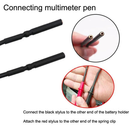 Essential Tool for Daily Car Maintenance Leakage Checks - close-up of multimeter probe pens and connection to battery holder for leak testing