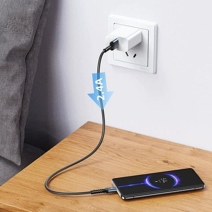 Remax RC-C008 2.4A TPE Soft Anti Breakage Data Cable 1m USB C Micro USB 8 Pin fast charging 2.4A TPE cable plugged into wall and phone