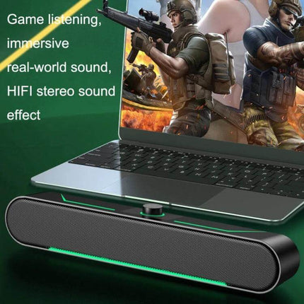 Wired LED Computer Speakers For Desktop Use, Compact shown with laptop, LED lighting, volume knob, gaming audio setup