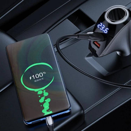 Car Charger With Digital Display For Daily Car Use plugged into a car socket showing 23.6V and fast-charging a smartphone to 100%