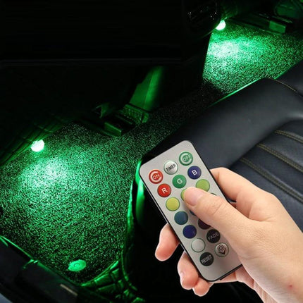 Car Ambient Light Kit With Wireless Remote For Easy Interior Mood showing remote control and green footwell lighting