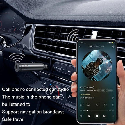 M416 Car Bluetooth Receiver Black For In Car Audio plugged into car AUX vent playing music from smartphone, hands-free calls via built-in mic
