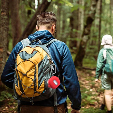 Essential Case for Samsung Earbuds in Everyday Activities - waterproof TPU protective case clipped to backpack during forest hike