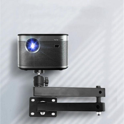 Wall-Mounted Foldable Projector Bracket for Versatile Adjustments showing dual-pivot black bracket with mounted compact projector in home theater