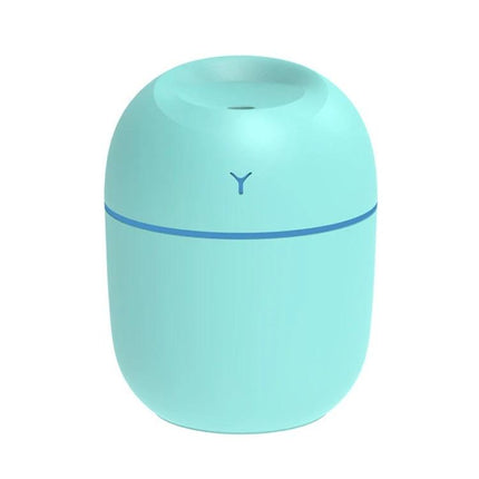 USB Mini Desk Humidifier 250ml With Colorful Night Light shown in mint green on a desk, compact USB-powered humidifier with soft multicolor glow