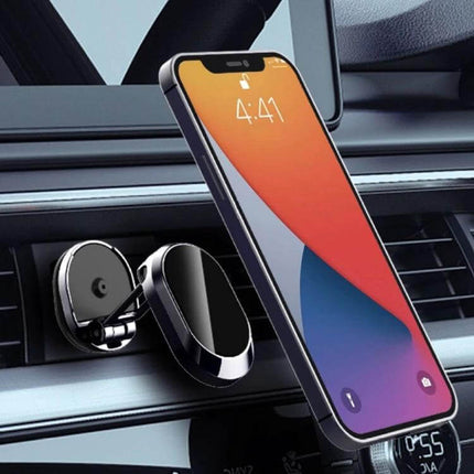 Car Magnetic Phone Holder Foldable With 360 Degree Rotation Black mounted on car vent holding smartphone for hands-free navigation