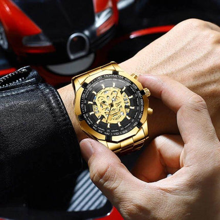 BINBOND Waterproof Quartz Watch with Skeleton Design gold stainless steel men's watch on wrist showing skeleton dial luminous hands and calendar