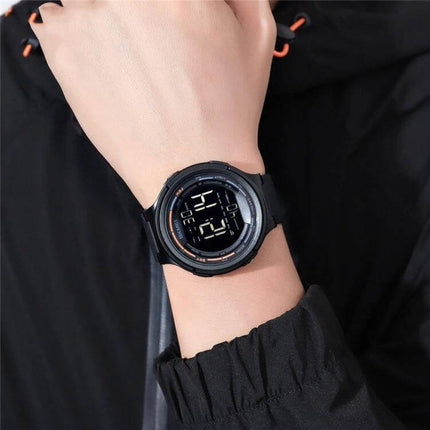 SKMEI Waterproof Luminous Outdoor Sports Watch for Daily Use on wrist, black digital luminous display, 50m water-resistant sports watch