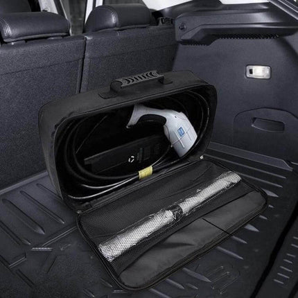Electric Car Fireproof Charger Storage Bag for Cords open in car trunk showing organized charger, cable and ergonomic handle, waterproof fireproof protection