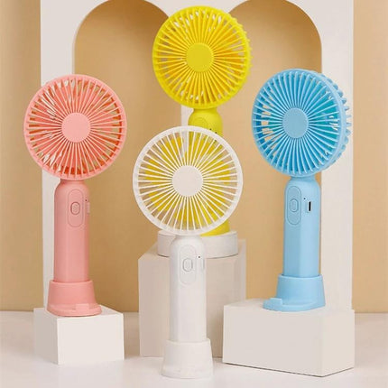 Portable Handheld Mini Fan for Outdoor and Indoor Cooling in pastel colors — compact rechargeable handheld fan with three adjustable speeds