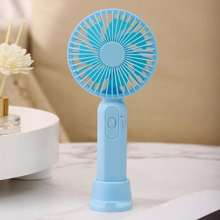 Portable Handheld Mini Fan for Outdoor and Indoor Cooling in compact blue design with three-speed control and portable stand