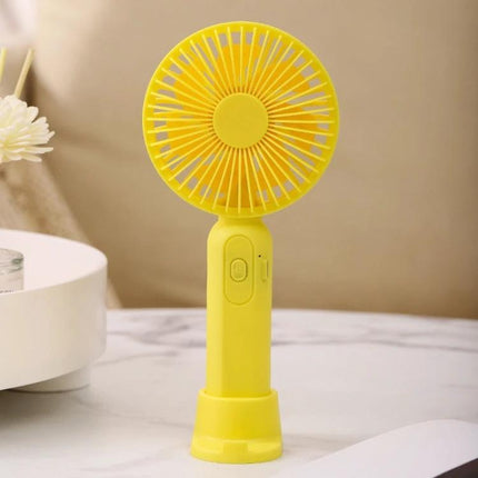 Portable Handheld Mini Fan for Outdoor and Indoor Cooling in compact yellow handheld design with three-speed button