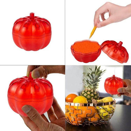 Red Pumpkin Fruit Fly Traps 2 Pack for Kitchen and Home - red recyclable PP pumpkin trap shown open with bait being added and placed by fruit bowl