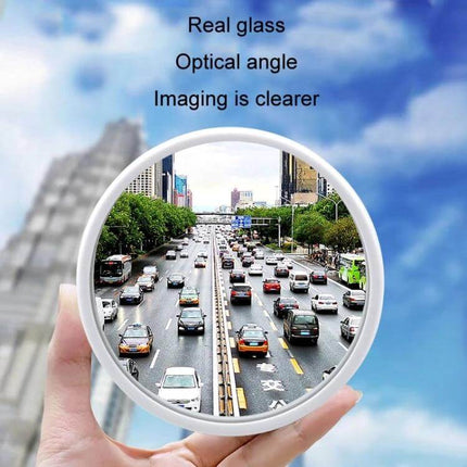 Car Rearview Mirror for Blind Spot Assistance in Black, White, Silver - wide-angle glass view of busy highway traffic
