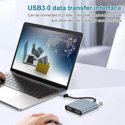 USB to Dual HDMI Screen Extender for Laptops and Monitors connected to a laptop via USB3.0 showing dual HDMI ports and expanded workspace