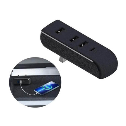 Tesla Model 3/Y Car USB Hub With 3 USB Ports And Type C Port installed in glovebox showing 3 USB-A ports and USB-C charging a smartphone