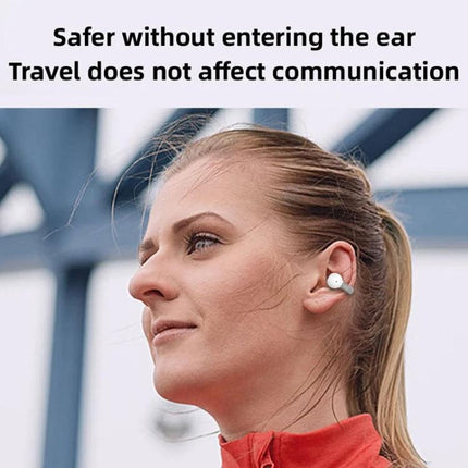 Single Clip On Bluetooth Earphone For Hands Free Calls woman wearing single clip-on earphone while commuting outdoors