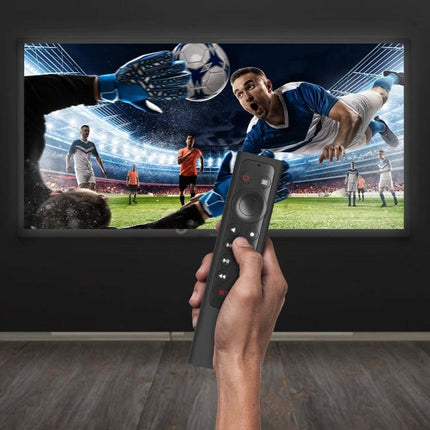 Silicone Case for NVIDIA Shield TV Pro Remote with Lanyard protecting remote in living room while watching soccer on TV, glow-in-the-dark feature
