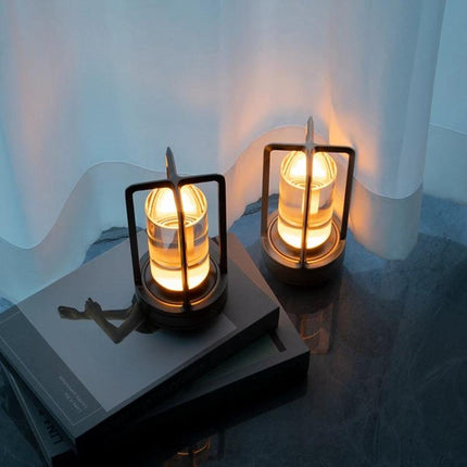 A Lamp That Lights Up Your Home and Camping Nights Easily - portable modern lanterns glowing on a nightstand and beside a curtain
