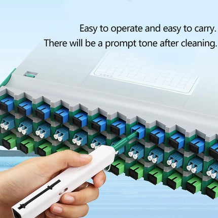 Handheld Fiber Optic Connector Cleaning Tool for Maintenance used by technician cleaning multiple fiber connector ports during routine inspection