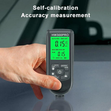 Coating Thickness Gauge for Paint and Industrial Use handheld HW300PRO measuring paint thickness on a car panel, self-calibration display