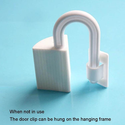 Door Seam Protector Anti-Pinching Safety Stopper For Doors white plastic clip shown hanging on door frame to prevent pinched fingers
