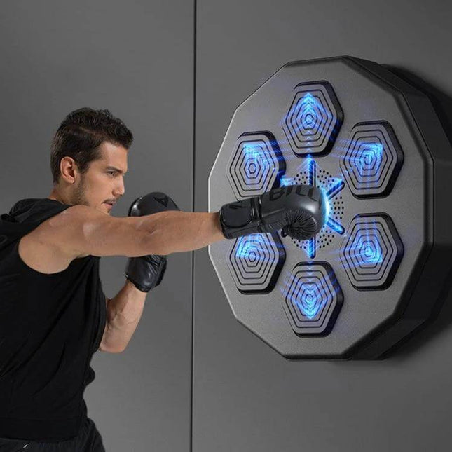 Man punching wall-mounted unit with blue LEDs - Bluetooth Intelligent Music Boxing Trainer Wall Mounted Home Practice