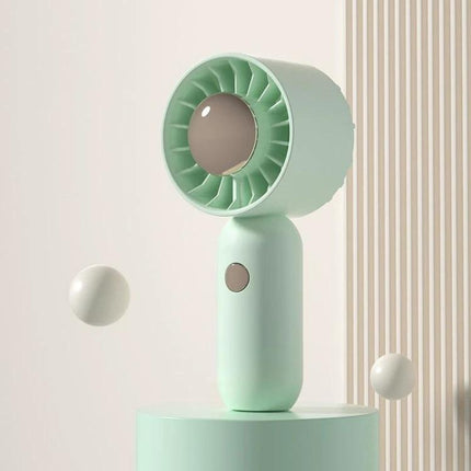 Handheld Mini Fan with Duck Design for Portable Cooling in mint green, compact portable desk or travel fan with three-speed button